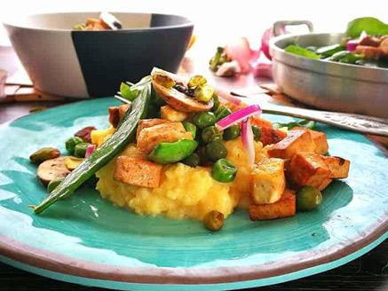 Vegetables and Tofu in Soy and Dates Honey on a Bed of Creamy Polenta